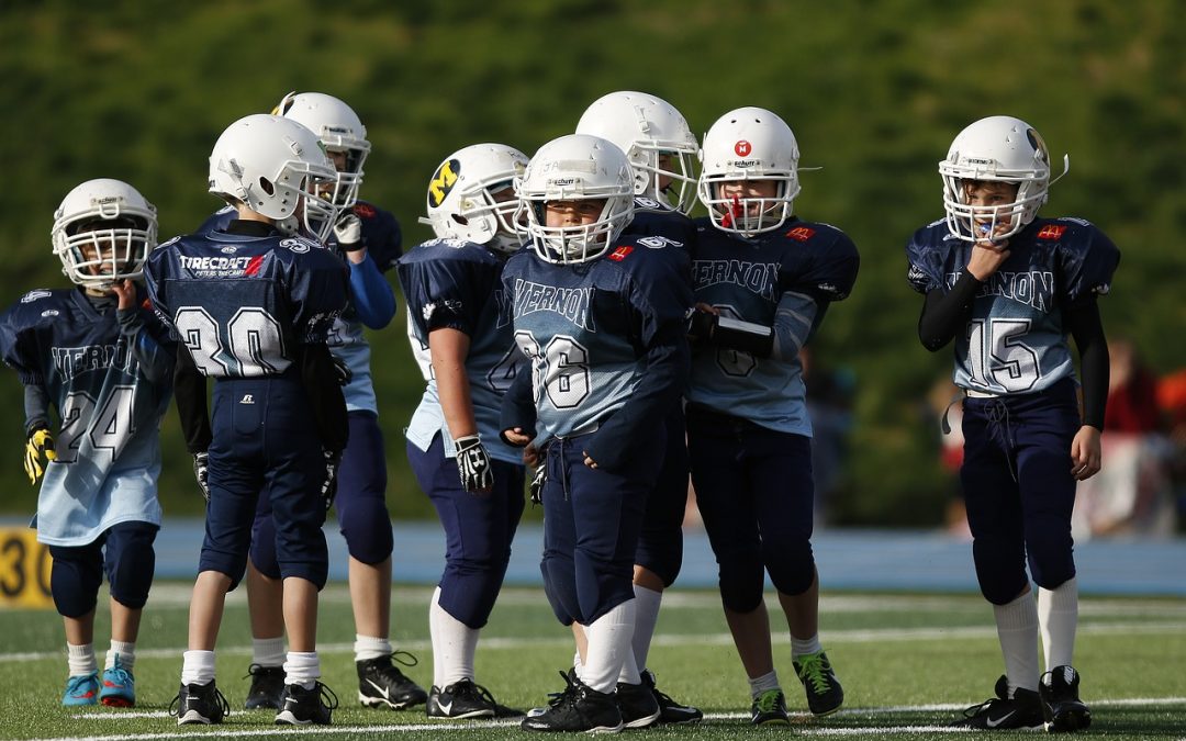 Youth Football “Suits” Up