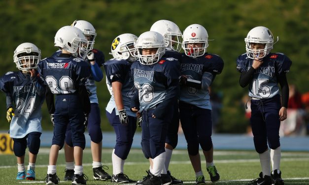 Youth Football “Suits” Up